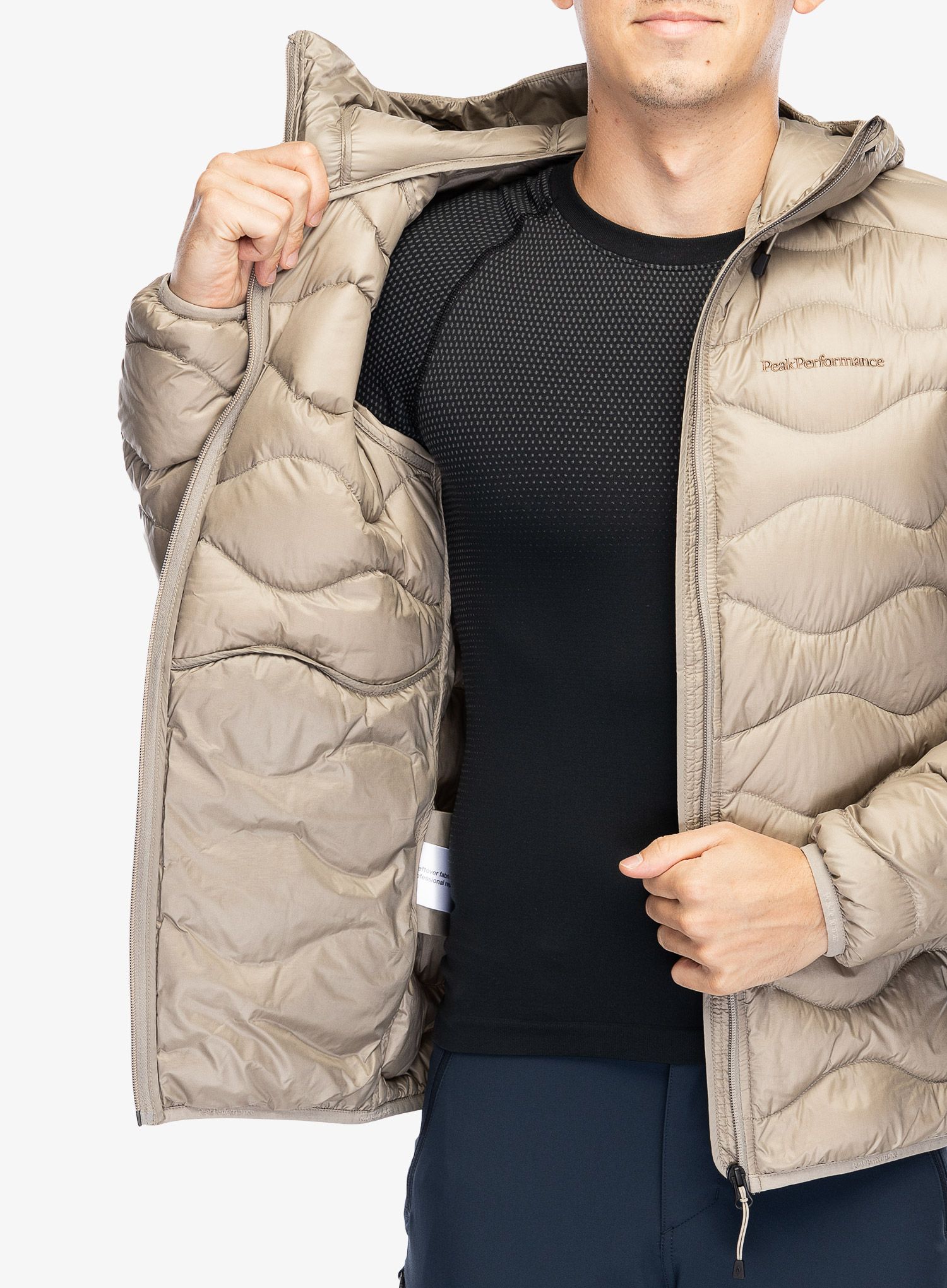 Páperová bunda Peak Performance Helium Down Hood Jacket - avid beige